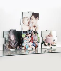 cornice a forma di puzzle in legno personalizzata con foto